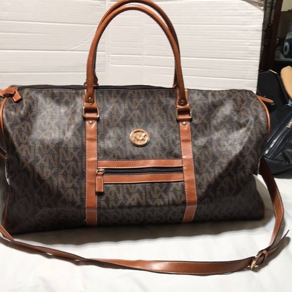 NK Handbags - NX signature logo weekender, fully lined with inside zipper pocket.